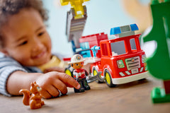 Fire Truck with Hose and Firefighter